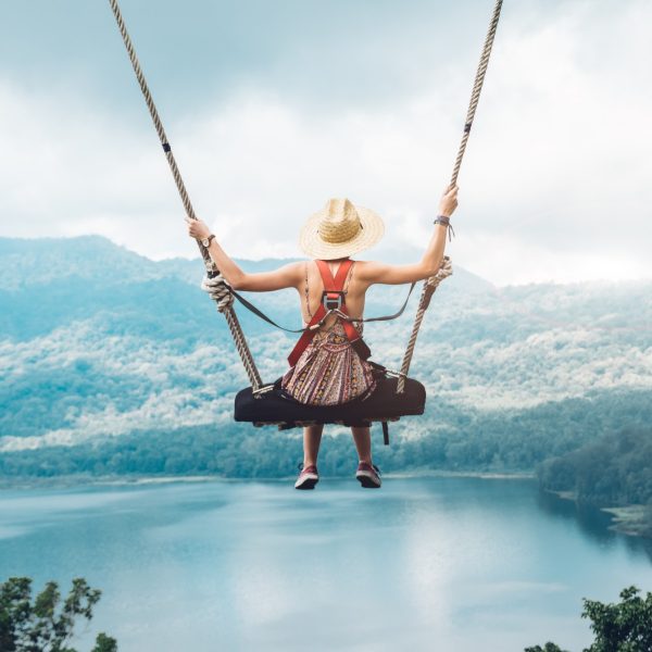 beautiful-girl-enjoying-freedom-on-swing-in-bali-indonesia.jpg